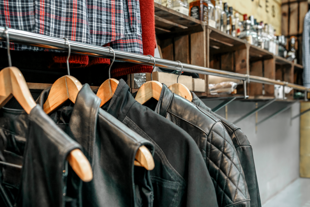 secondhand leather jackets on a rack